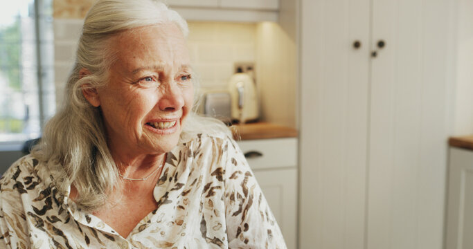 Thinking, senior woman and crying at house with depression, mourning loss and sad memory. Emotional, elderly person and grief for broken heart, loneliness and sorrow of nostalgia reflection in lounge - Powered by Adobe