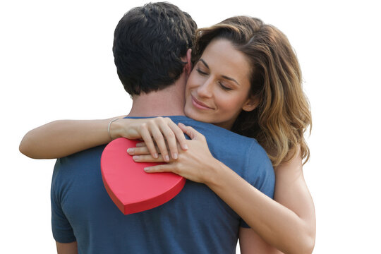 Loving couple embracing with heart-shaped gift expressing affection and romance transparent background