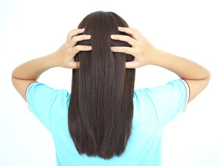 Dandruff or lice in her hair woman and scratching her head for healthcare concept. 