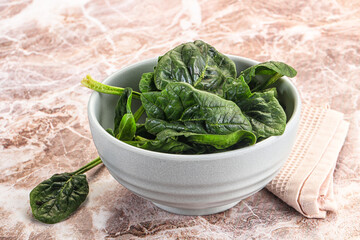 Fresh green spinach leaves heap