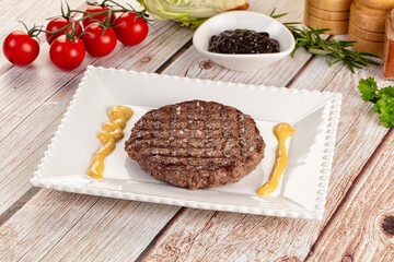 Grilled juicy beef cutlet for burger