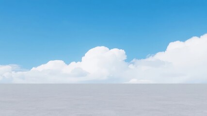 Obraz premium Serene Skyline with Fluffy Clouds Over a Calm Horizon