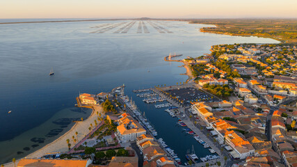 Aerial panorama of Meze at sunrise, in Occitanie, France
