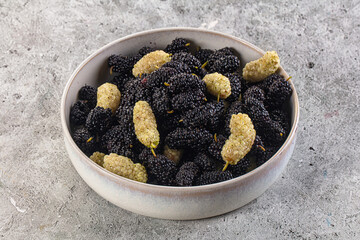 Ripe sweet juicy black and white mullberry