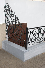 Detail of a building facade with a metall door