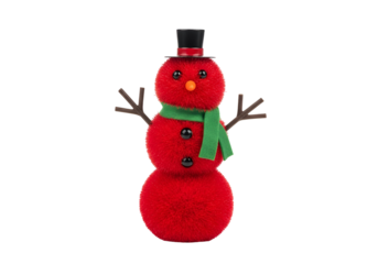 A festive, red snowman figurine stands out against a black background, adorned with a black top hat, green scarf, and brown twig arms.