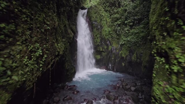This aerial shot captures the unique beauty of Cataratas Las Gemelas (The Twin Waterfalls) in the Bajos del Toro region of Costa Rica.