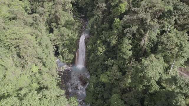 This aerial drone shot captures the unique beauty of Cataratas Las Gemelas (The Twin Waterfalls) in the Bajos del Toro region of Costa Rica.