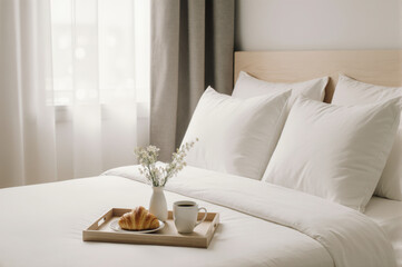 White pillow white blanket wooden tray croissant coffee vase flower soft light cozy bedroom create peaceful morning atmosphere with neatly made bed and breakfast in bed