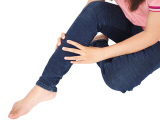 Asian woman hand touch massage her calf on floor in bedroom at home, Her has leg cramp muscle pain. Health and medical concept. 