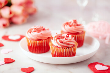 Red velvet cupcakes with whipped cream for Valentine's day