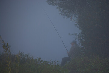 fishing in the foggy lake
