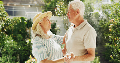 Senior couple, dancing and garden with love for retirement, romance or commitment together. Elderly, man and woman bonding in outdoor nature for anniversary, old memory or celebration in backyard