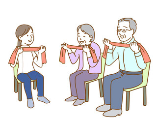 車いすの高齢者　筋肉トレーニングをする