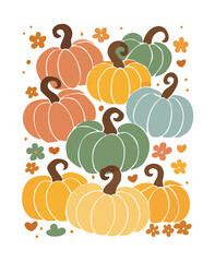 A collection of pumpkins in various fall colors with small floral accents autumn