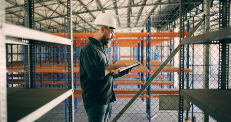 Inspection, schedule and tablet with construction worker man in warehouse for agenda or checklist....