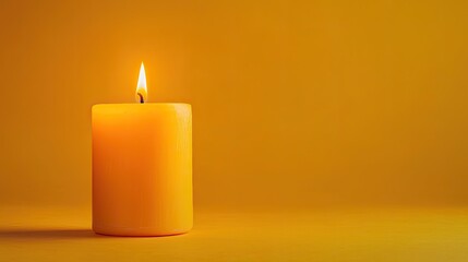 A single lit candle on a yellow background.