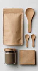 Beige packaging,  glass jar, wooden utensils,  flat lay