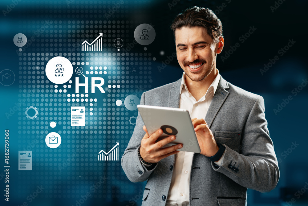 Poster business professional engaged in hr tasks using a tablet with digital graphics in the background at 