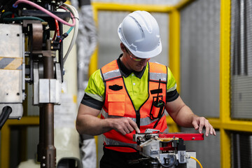 Smart Caucasian engineer work setup AI automated in robotics electronics engineering laboratory....