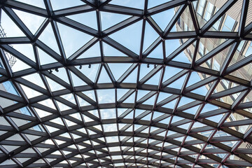 Architectural glass structure with a geometric triangular pattern, Steel glass roof wall construction transparent window with support system