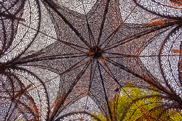 intricately detailed sculpture made of rusty metal