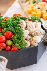 fresh vegetables and mushrooms on the table.
