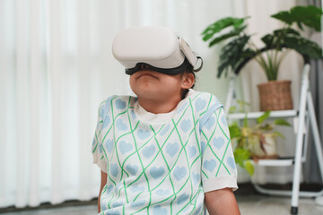 Happy asian girl amazed by virtual reality experience. Immersive technology.