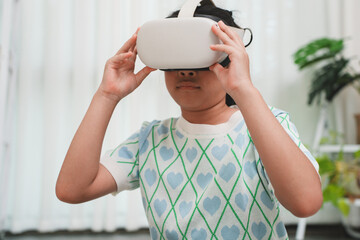 Young girl adjusting VR headset , preparing for virtual reality experience. Concept of immersive education, interactive gaming, and modern edtech.