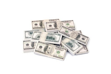 Money stack 100 dollar bills bundled isolated on white background.