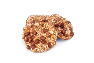 Snacks Traditional Thai desserts. Crispy crunch fried peanut wild yam cracker cookies isolated on white background.