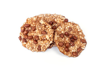 Snacks Traditional Thai desserts. Crispy crunch fried peanut wild yam cracker cookies isolated on white background.