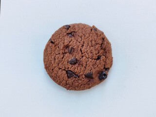 Closeup of delicious chocolate chip cookies arranged on white background, sweet baked snack dessert for food photography and culinary design.