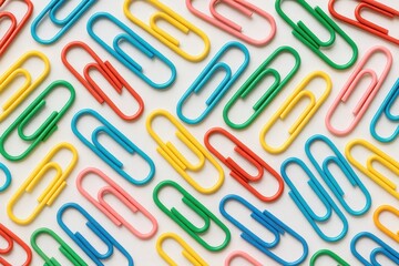 Vivid Clutter: A Colorful Symphony of Stationary Elements: A striking shot of assorted paper clips. A burst of color that can bring a smile to your face.