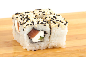 Delicious Sushi Roll with Cream Cheese and Sesame Topping