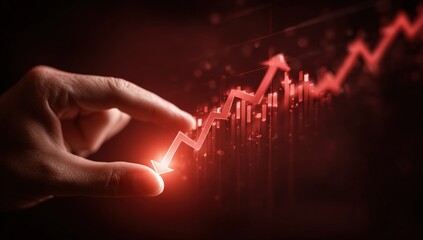Hand manipulating a downward trend graph