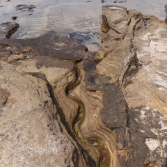 Gran Canaria, textures of the rocks of El Confital beach on the edge of Las Palmas de Gran Canaria,...