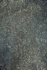 Closeup of old weathered rock background texture.