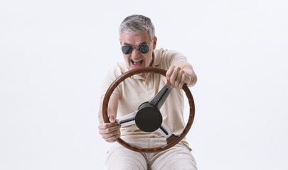 Man holding a steering wheel and driving an invisible car