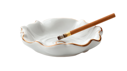 White ceramic ashtray with gold trim, cigarette