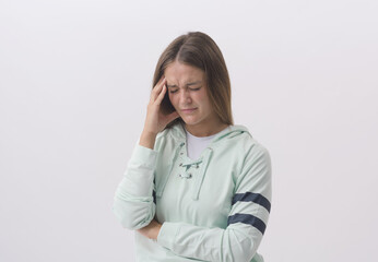 Young exhausted woman having a headache