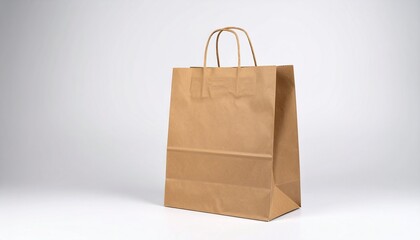 isolated empty blank brown paper shopping bag on white background