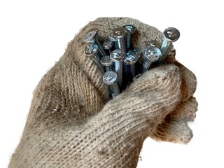 Close up of a gloved hand firmly holding shiny steel nails, isolated on white background. Sharp detail shows strength and focus. Ideal for construction, repair, labor, and industry concepts.