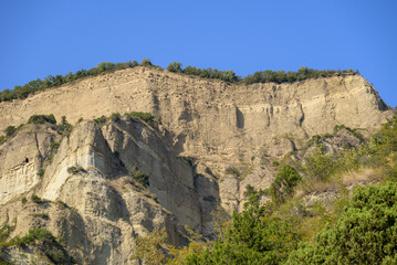 Fototapeta premium Caves carved by monks in Shio-Mgvime Monastery, medieval monastic complex of Georgian Orthodox Church near Mtskheta, Georgia