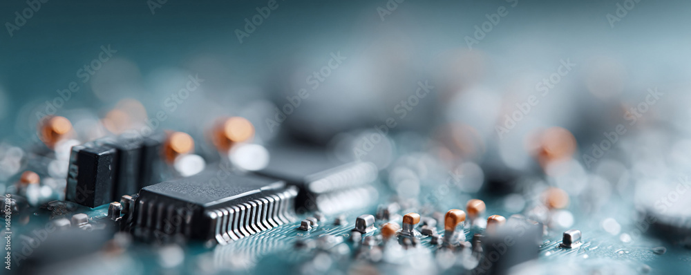 Poster macro shot of a teal circuit board. illustrates technology, innovation, and connectivity. useful for
