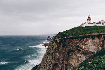 Dramatic coastal cliffs with waves in Portugal