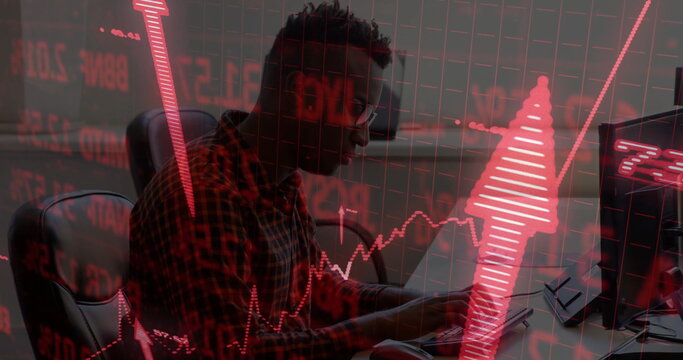 Man wearing glasses, checkered shirt analyzing data on laptop and monitors in office, copy space - Powered by Adobe