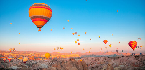 Obraz premium Aerial view of hot air balloons over beautiful Cappadocia landscape