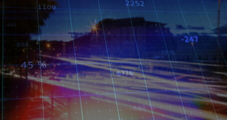 Showing vehicle light trails streaking along highway at night, with translucent data grid overlay