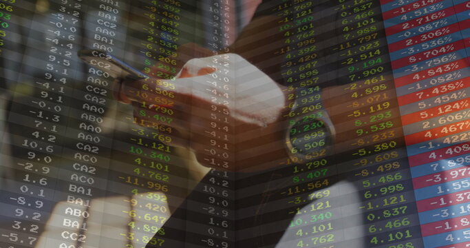 Businessman wearing dark suit striped tie holding smartphone in trading floor, with ticker overlay